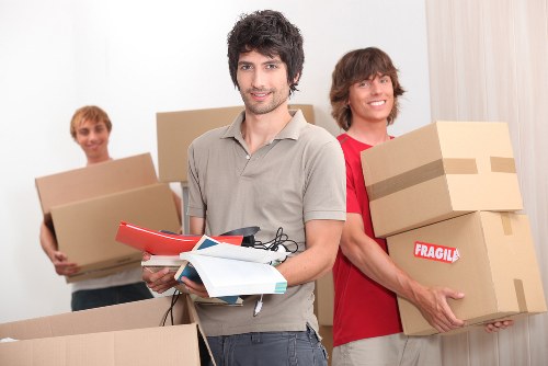 Packed moving boxes prepared for a removal van booking