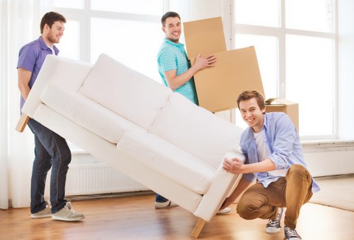 Professional removals team planning a local move in S