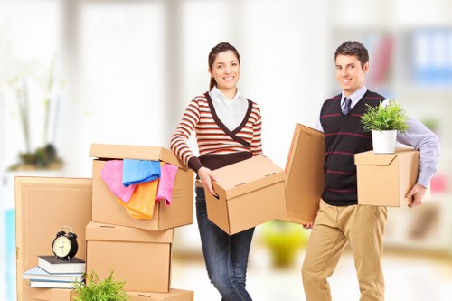 Movers comparing quotes and planning a relocation in S